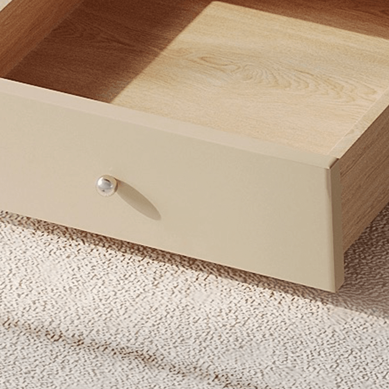 Close-up of metal legs with solid wood tabletop—highlighting quality noted in round coffee table with metal legs reviews