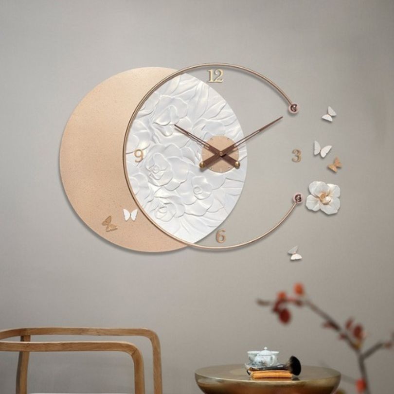 Modern wall clock with quartz movement displayed in a stylish living room setting.