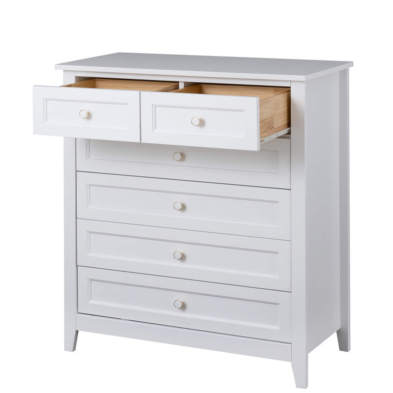 Modern antique white storage cabinet in a cozy bedroom setting, demonstrating its spacious drawers.