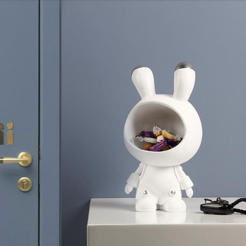 Grey Space Bunny Storage Sculpture in a living room, blending fun and functionality.