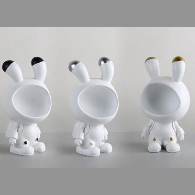 Space Bunny Storage Sculpture in white, showcasing its playful design and spacious mouth for storage.