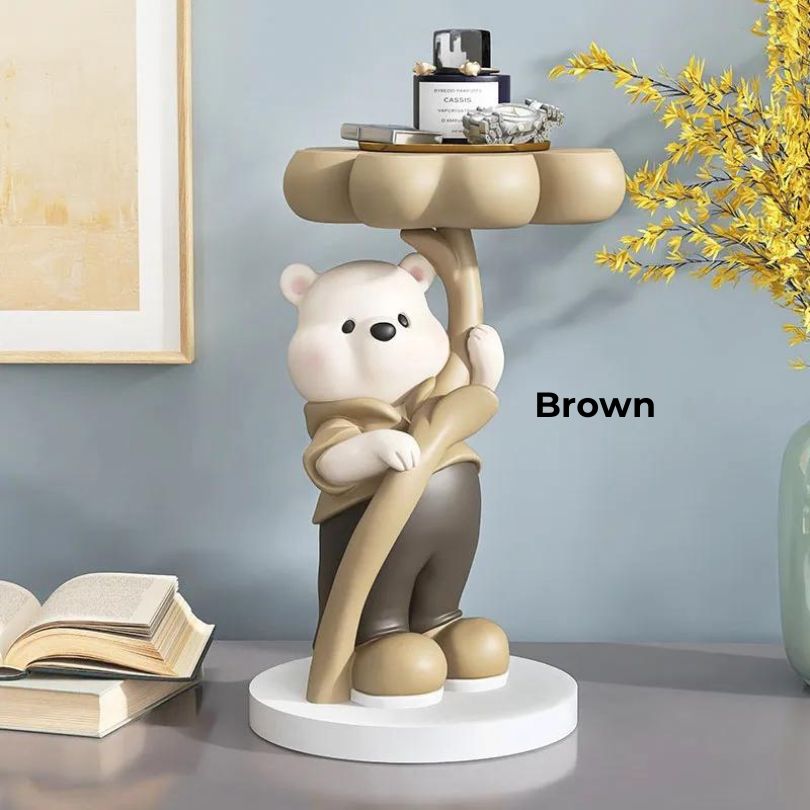 Unique bear sculpture with tray top displayed elegantly on a dining table.