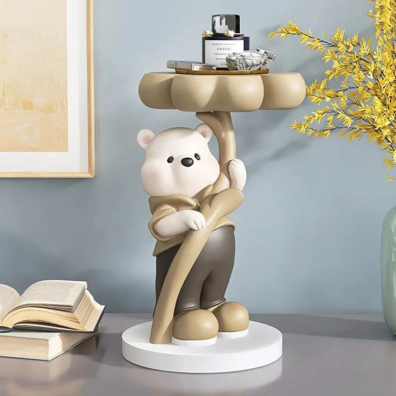 Eye-catching modern bear sculpture in a cozy bedroom, highlighting its vibrant colors.