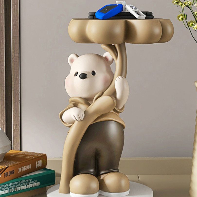 Eye-catching modern bear sculpture in a cozy bedroom, highlighting its vibrant colors.
