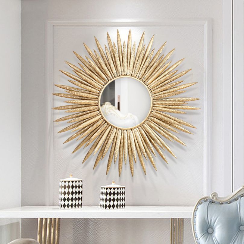 Front view of sunflower radiance modern decorative wall mirror showcasing its gold finish and round design.