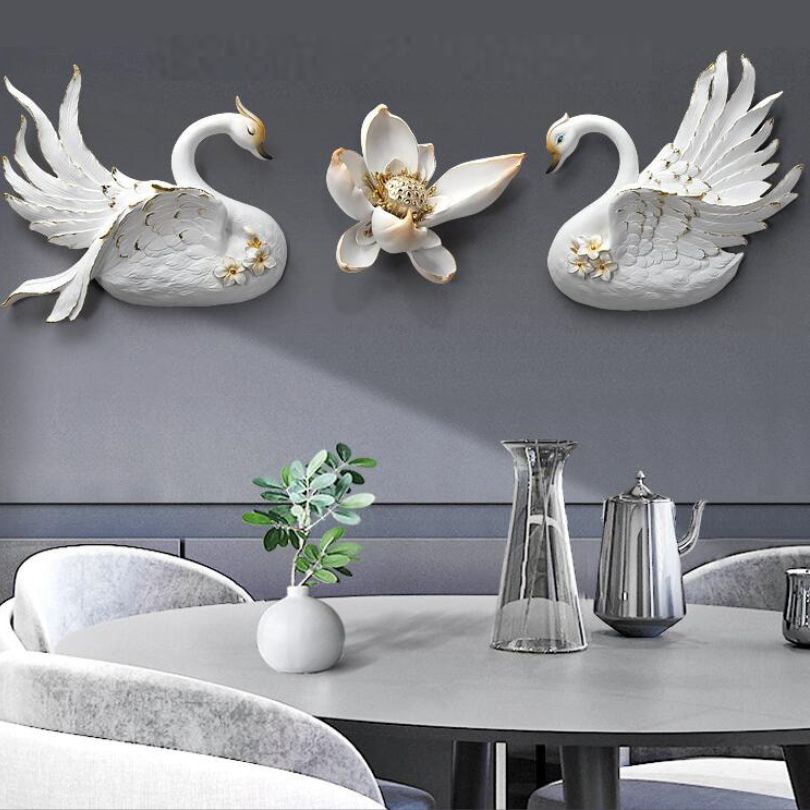 Stylish swan wall art in a bright living room setting.