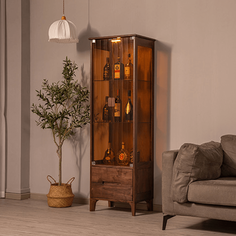 Side view highlighting the stylish storage cabinet with drawers.
