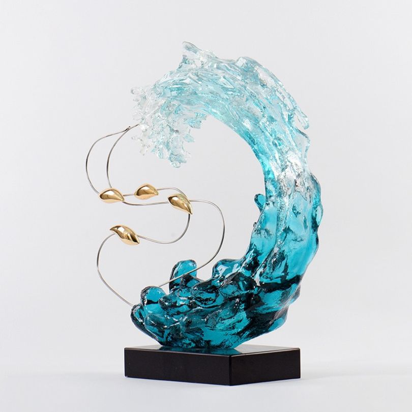 The Serene Blue Wave Resin Sculpture in a cozy bedroom setting, emphasizing its versatility as home decor.