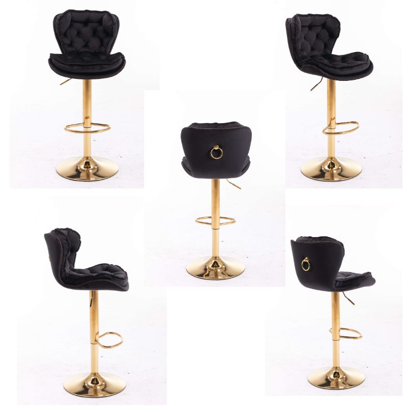 Stylish black and gold bar stools displayed in a contemporary kitchen.