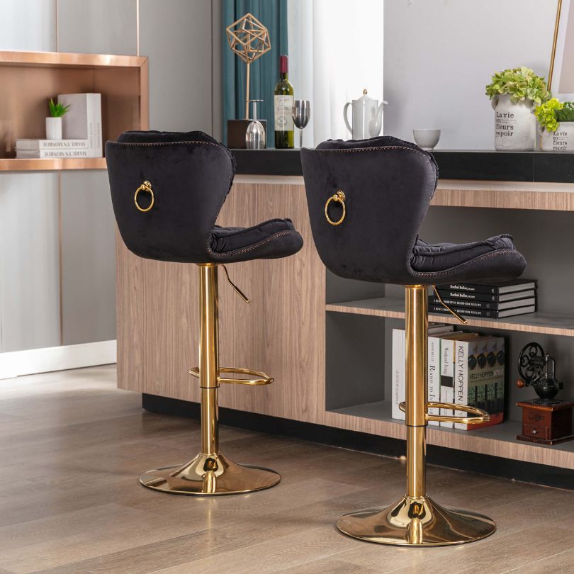 Elegant modern bar stools at a home bar setting with adjustable height feature.