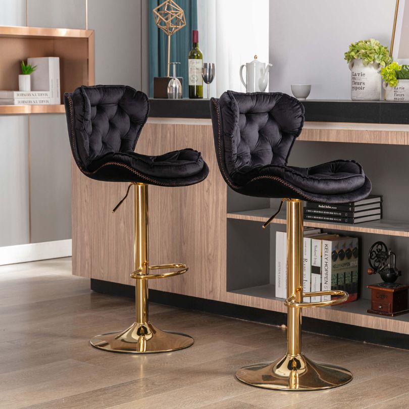 Elegant modern bar stools at a home bar setting with adjustable height feature.