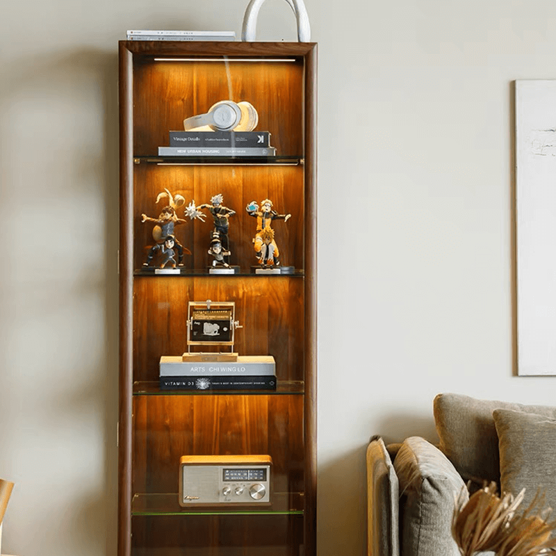 Side angle of display cabinet showing slim walnut frame and clear glass door