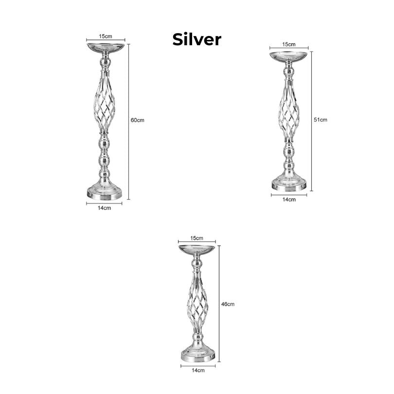 Elegant metal flower holder centerpiece displayed on a beautifully set wedding table.