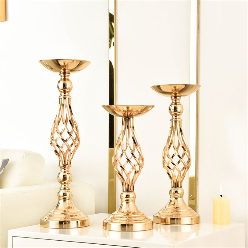 Three sizes of the metal flower holder arranged together, highlighting versatility for events.