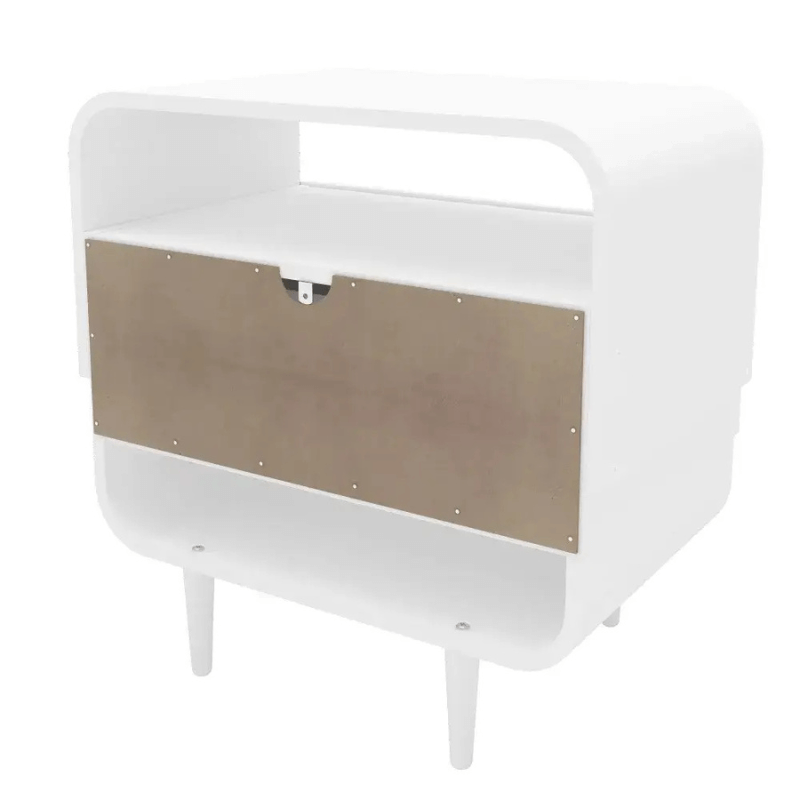 Elegant white nightstand with lamp and decor items on top in a beautifully styled bedroom.