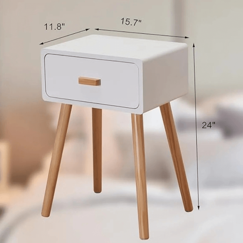 Elegant modern white nightstand set showcasing sleek design and wooden legs from a side angle.