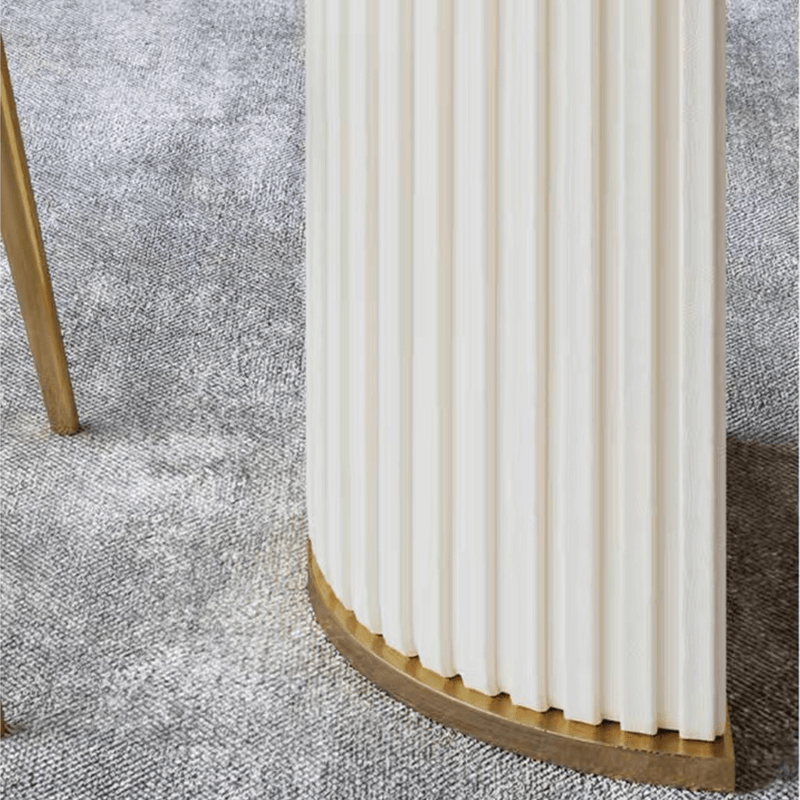 Sleek oval marble dining table showcasing its smooth surface and rounded corners.