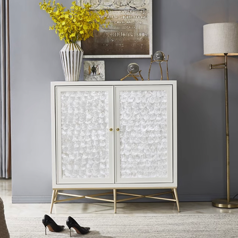 Front view of Nordeluxe white shoe cabinet in small size beside neutral décor