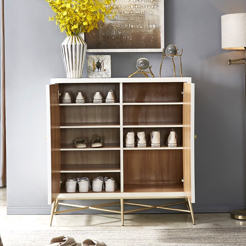 Front view of Nordeluxe white shoe cabinet in small size beside neutral décor