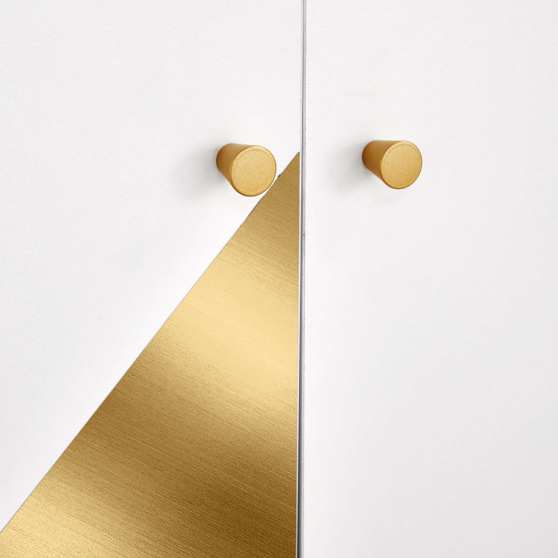 Side view of the modern white shoe cabinet displaying its spacious shelves and elegant gold hardware.