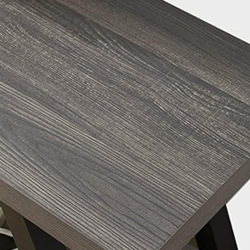 Close-up of dark gray MDF surface and powder-coated metal detailing