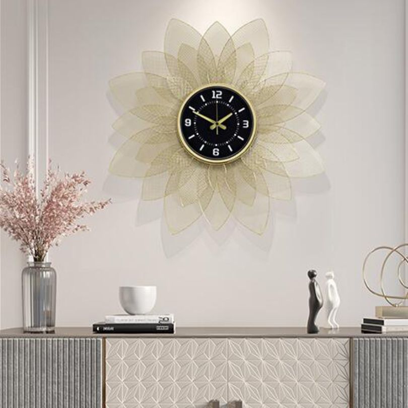 Close-up of the elegant sunflower design of the wrought iron clock.