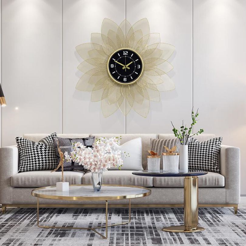 Close-up of the elegant sunflower design of the wrought iron clock.