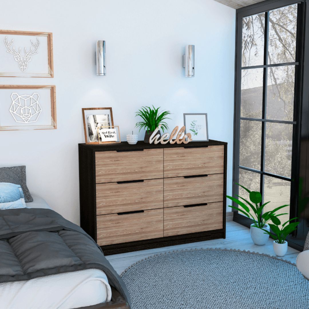 Mullen Extra Deep Chest Drawer showcasing elegant design and spacious drawers for bedroom organization.