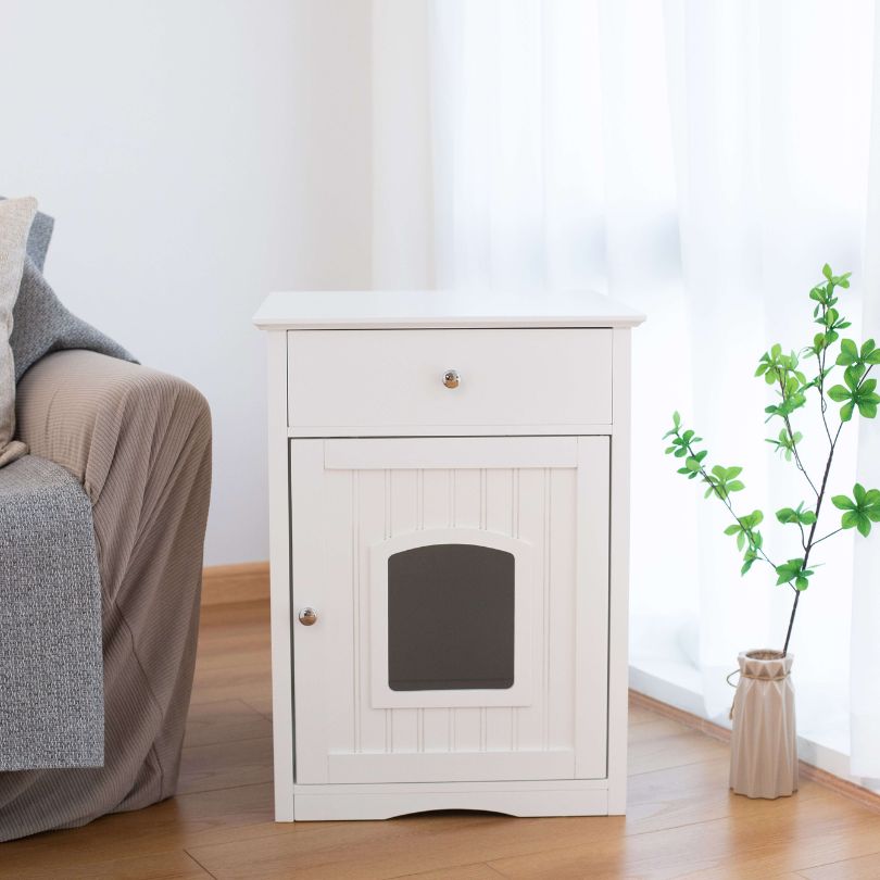 Stylish wooden cat litter box with storage, ideal for indoor use.