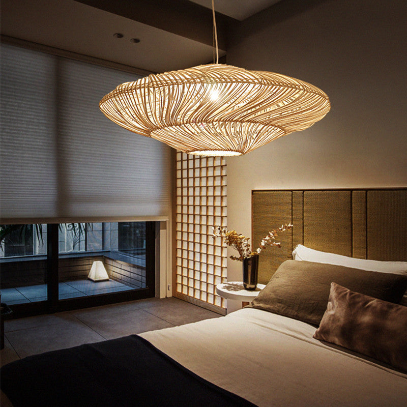 Close-up view of the wicker ceiling lamp, emphasizing its handmade craftsmanship.