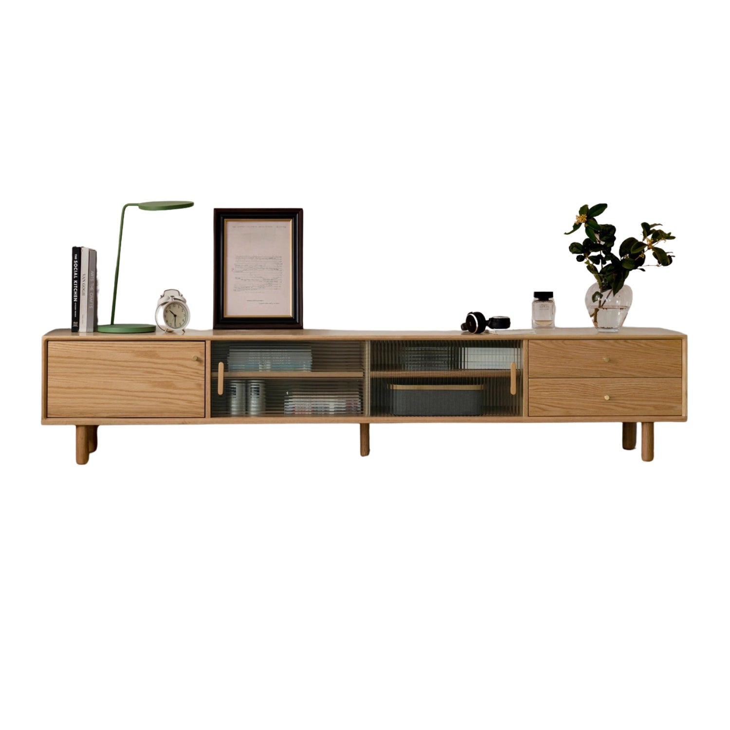Front view of the modern natural wood TV stand showcasing its sliding glass doors and two spacious drawers.