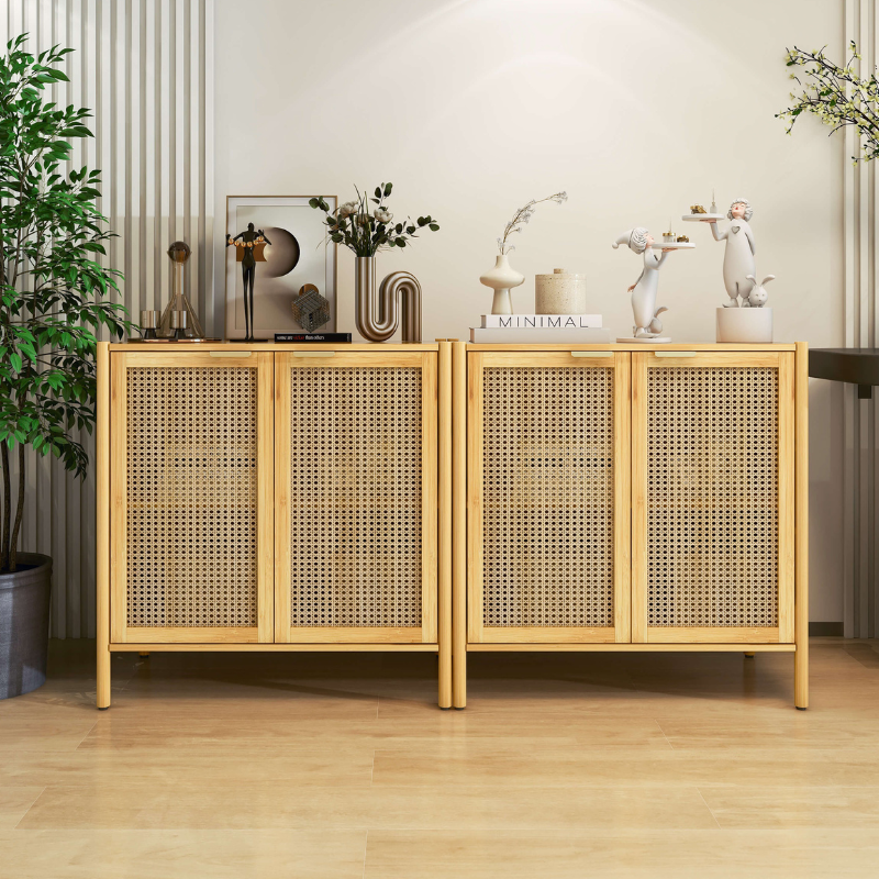 Chic natural rattan storage cabinet with doors in a modern living room setting.
