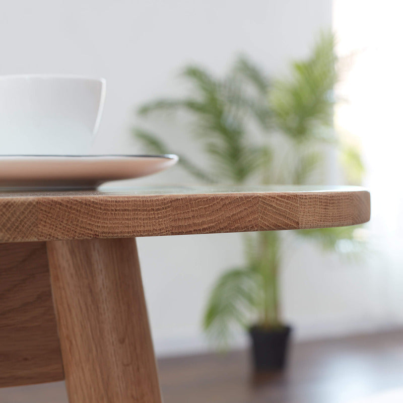 Stylish round dining table in a cozy home environment
