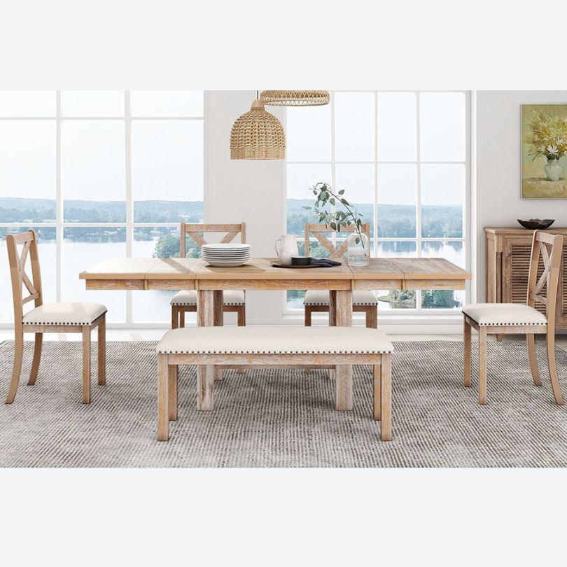 Family enjoying a meal at the farmhouse dining set, highlighting its inviting atmosphere.