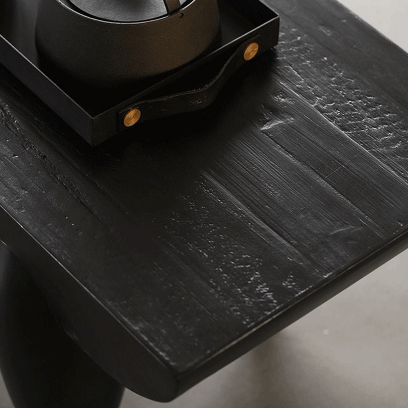 Nordic Black Steel Coffee Table in a modern living room setup, styled with decorative items.