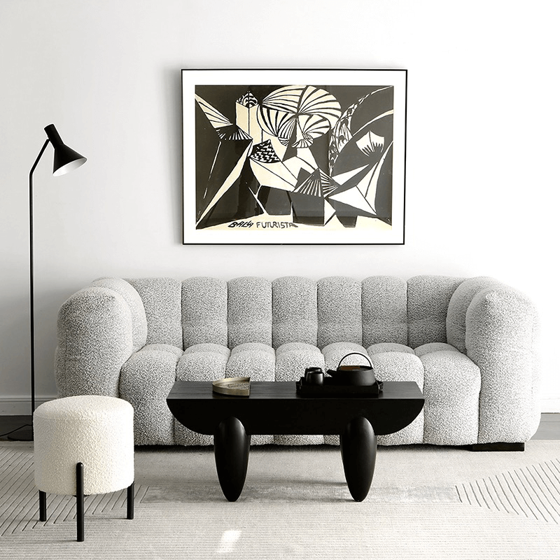 Nordic Black Steel Coffee Table in a modern living room setup, styled with decorative items.