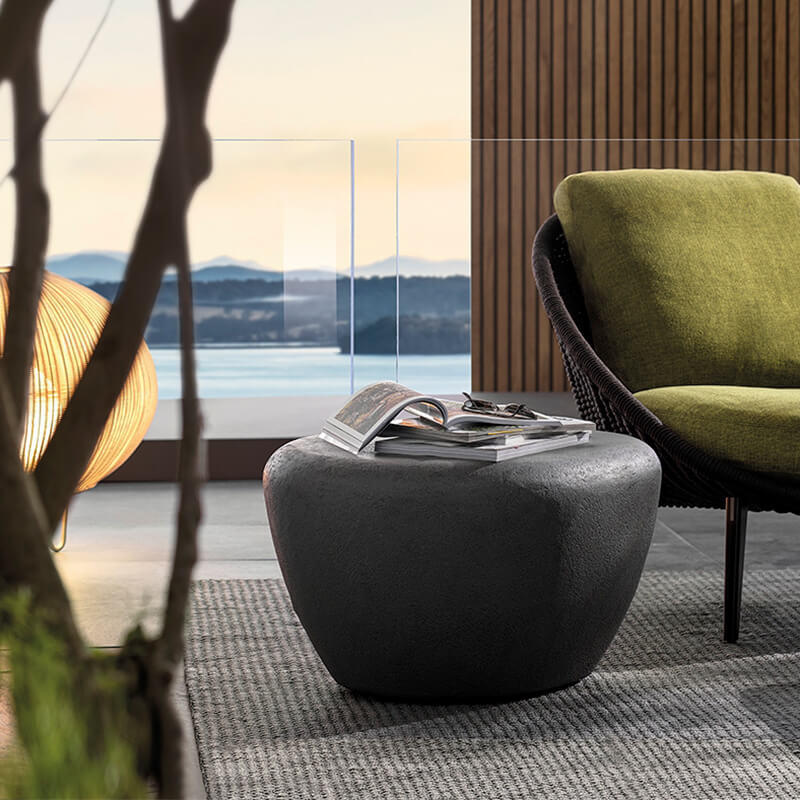 Front view of the Nordic Oval Concrete Outdoor Coffee Table showcasing its weather-resistant design.