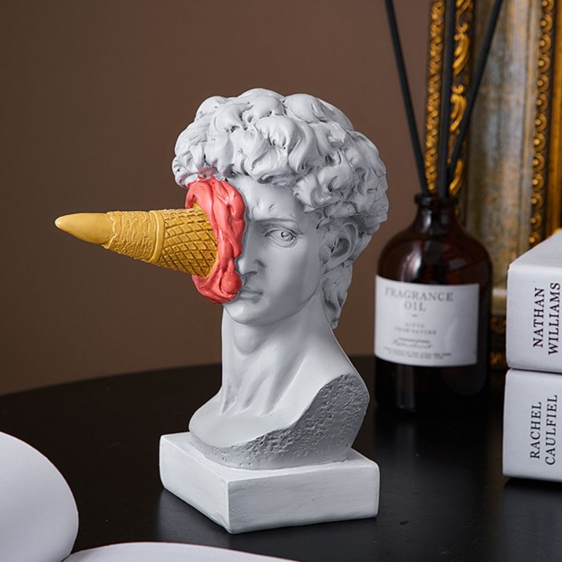 Side view of Nordic David sculpture with ice cream, emphasizing its unique artistic design.