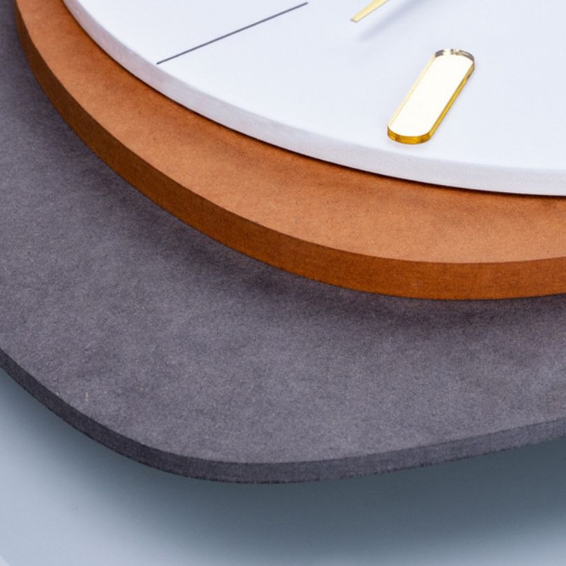 Front view of the Nordic Elegance 3D Wall Clock highlighting its unique design and colors.