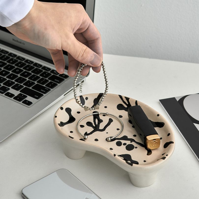 Detailed view of Nordic decorative tray used for organizing keys