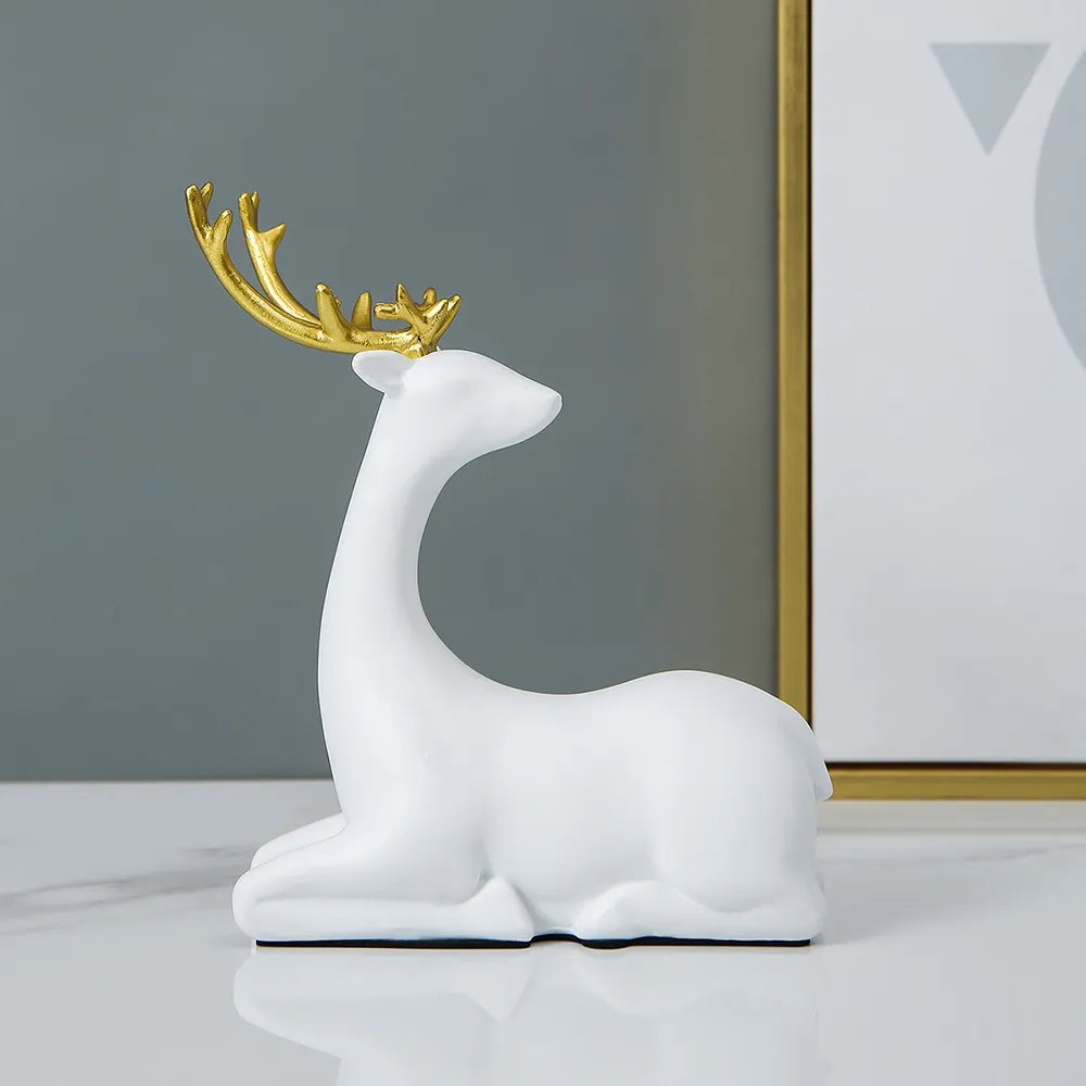 Elegant Nordic deer sculpture in white and gold for home decor