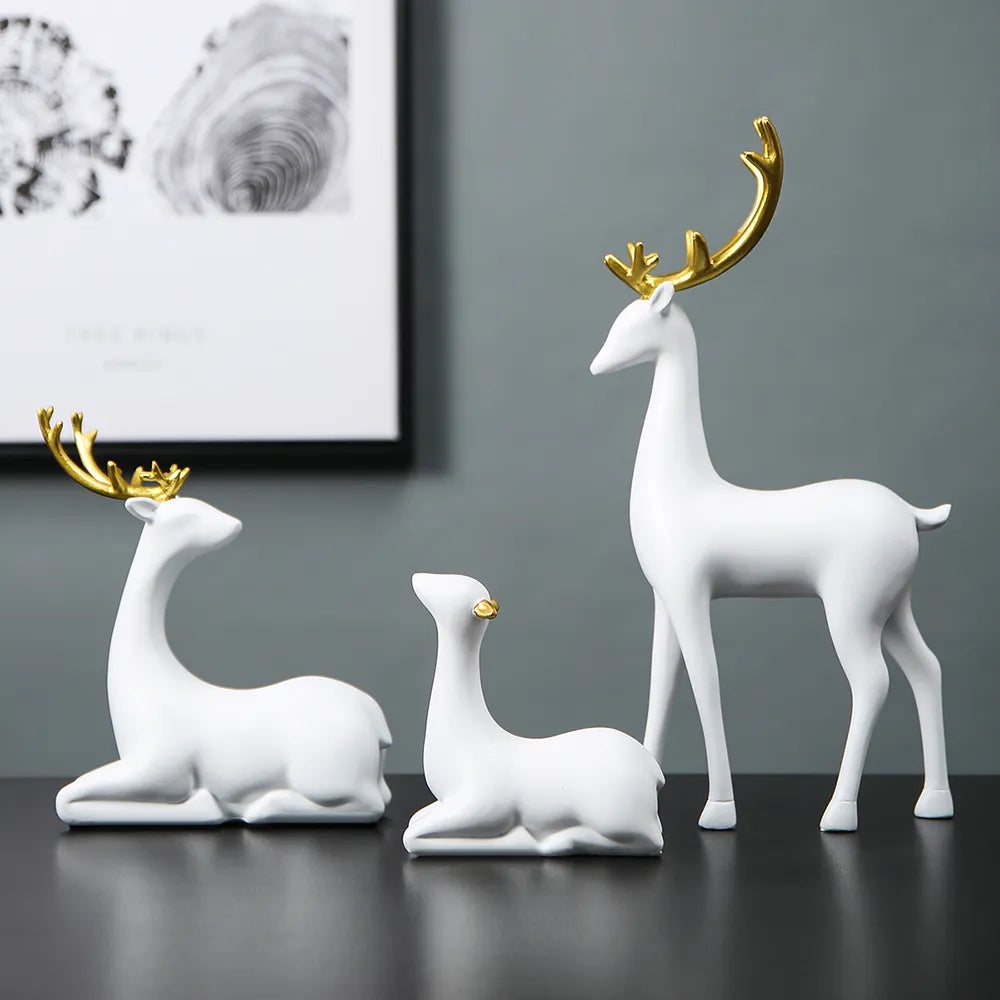 Elegant Nordic deer sculpture in white and gold for home decor