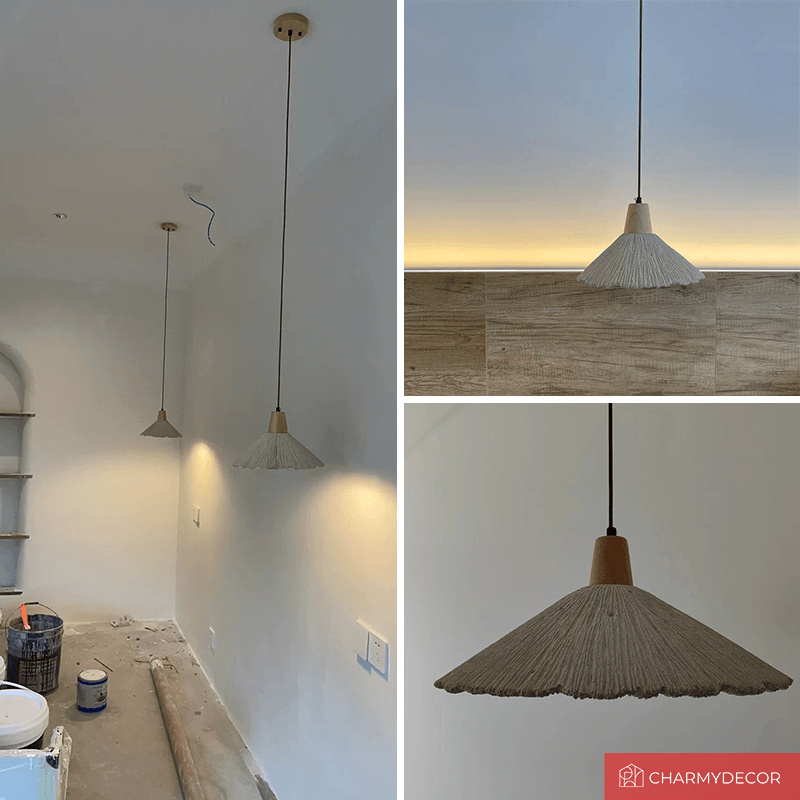 Close-up of the creamy cement shade and wooden accents of Nordic pendant light