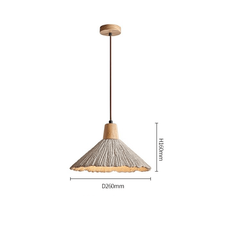 Nordic LED pendant light with cement design hanging above a dining table