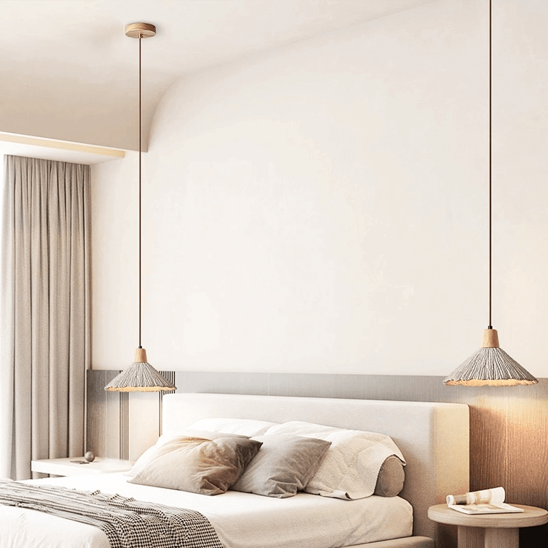 Close-up of the creamy cement shade and wooden accents of Nordic pendant light