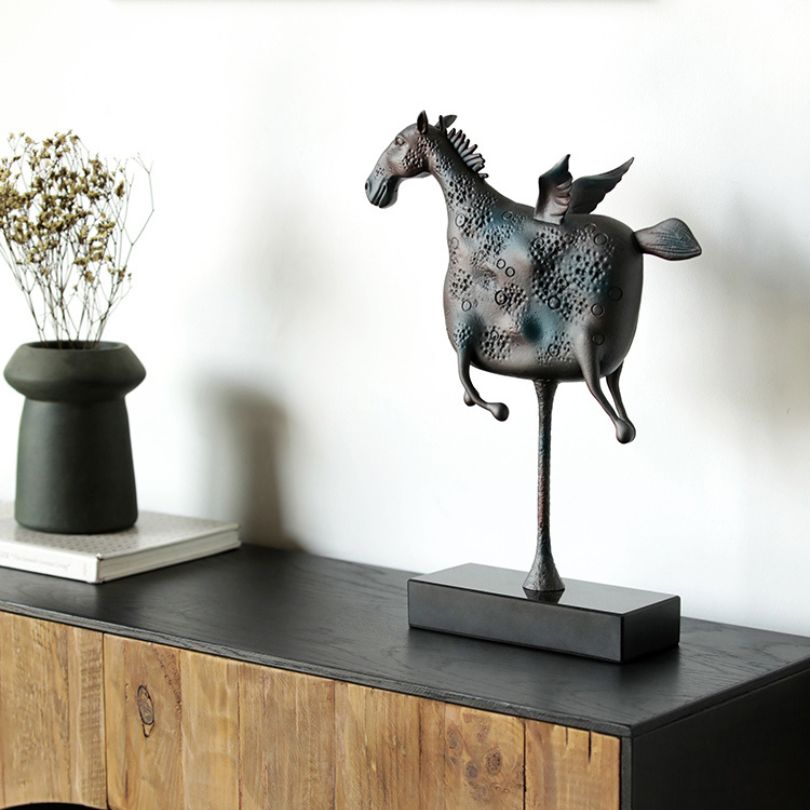 The Pegasus statue displayed in a modern living room, enhancing the decor.