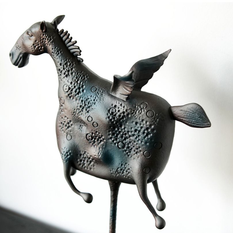 Close-up view of the Majestic Marble Pegasus Sculpture highlighting intricate details.