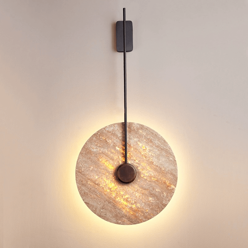 Close-up of the Nordic marble LED wall lamp showcasing its elegant design and warm light in a living room.