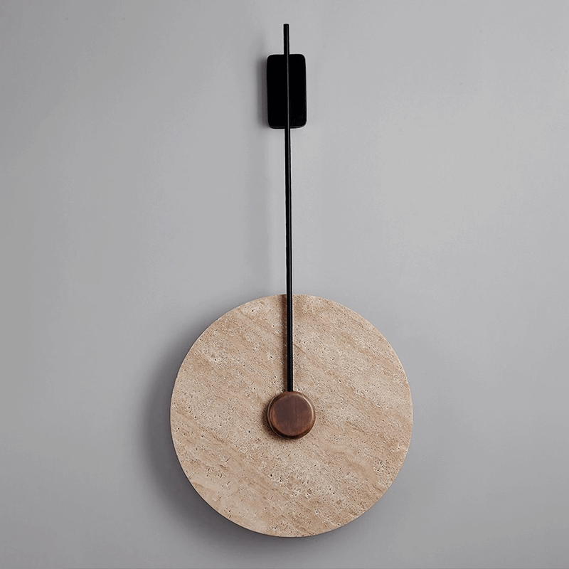The Nordic marble wall lamp mounted in a stylish bedroom, illuminating the space with soft, warm white light.