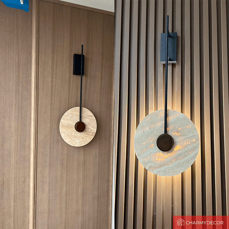 Close-up of the Nordic marble LED wall lamp showcasing its elegant design and warm light in a living room.